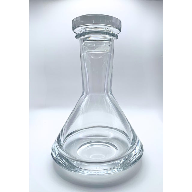 A gorgeous mid-century modern crystal decanter from the iconic "Romantica" line, masterfully designed in the 1960s by...