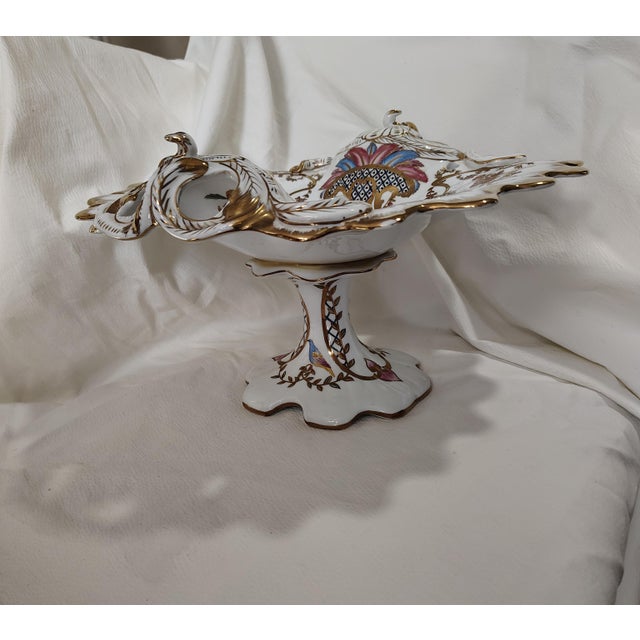 Antique porcelain server/bowl with rich floral design, botanical element featuring ornate gilded frameworks, scalloped...