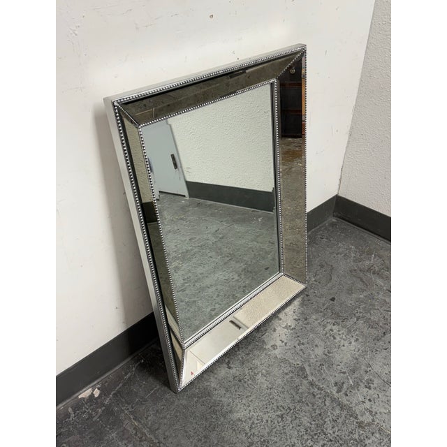Design Plus Gallery presents a Beaded Wall Mirror from Bassett Mirror Company. This rectangular mirror has antiqued...