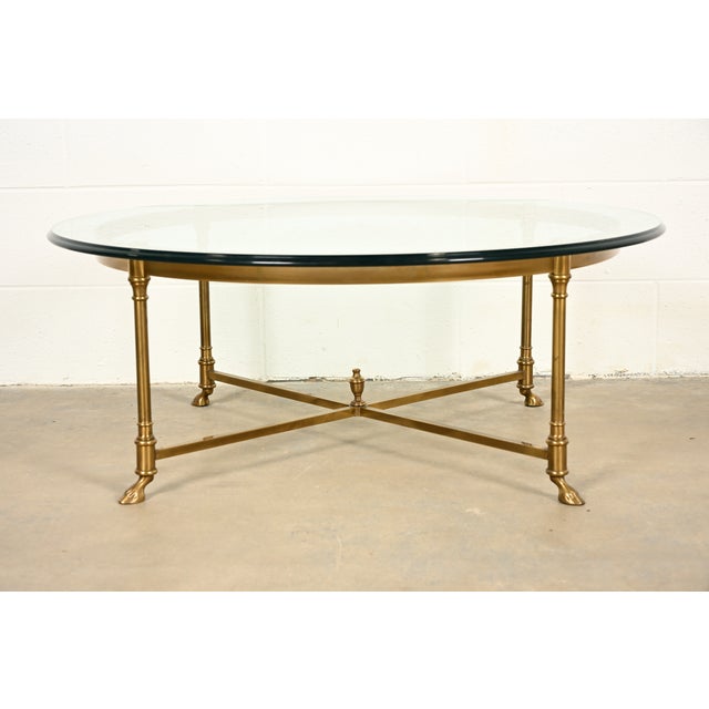 A gorgeous mid-century modern Hollywood Regency hooved feet coffee table or cocktail table By LaBarge USA, Circa 1960s...
