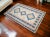 This is a beautiful vintage hand knotted distressed finish Rug from Turkey. It has primary blue and rose colors on a...