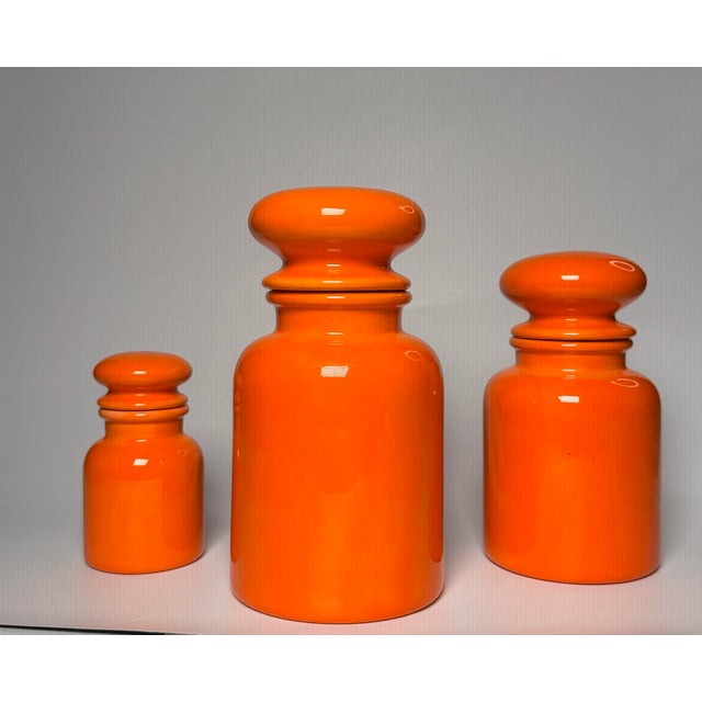 Mid-Century Modern Vintage Mid Century Modern Bright Orange Apothecary Lidded Jars, Set of 3 For Sale - Image 3 of 9