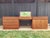 An exceptional example of Danish Modern craftsmanship, this authentic Arne Wahl Iversen for Vinde Møbelfabrik teak vanity...