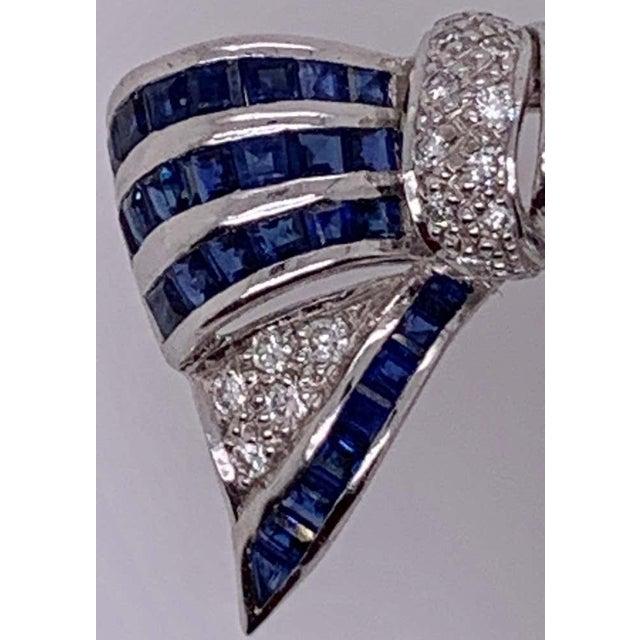 18Kt White Gold Sapphire And Diamond Bow Pin 1.10 TDW Total Weight 12.30 grams