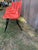 Set of 6 full-sized vintage ARTCO BELL CO bucket HARD PLASTIC CHAIR Mid Century retro orange with black metal frame and legs.