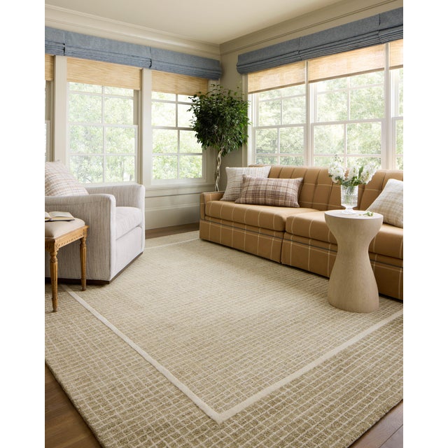 The Briggs Collection by Chris Loves Julia x Loloi is a beautifully detailed area rug with a soft, muted palette and...