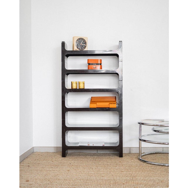 Composed of six brown plastic modules, the Jo Je Bins shelves are a symbol of 1970s Italian design. They were produced by...