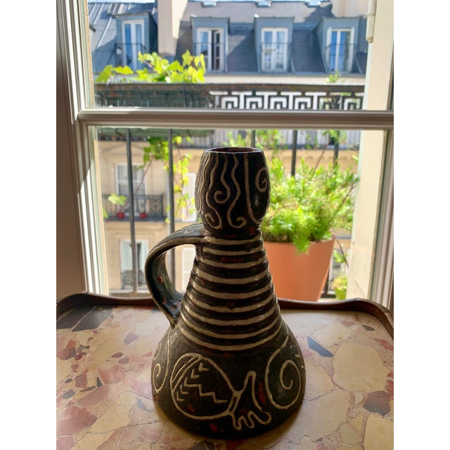 This 8.25" tall vase is a striking example of Brutalist design from mid-century Romania, personally sourced from a...