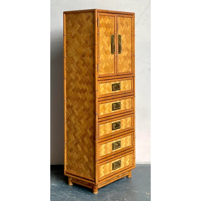 Elevate your interior with this exceptional vintage gentleman's chest, a stunning embodiment of Boho Chic and Chinoiserie...