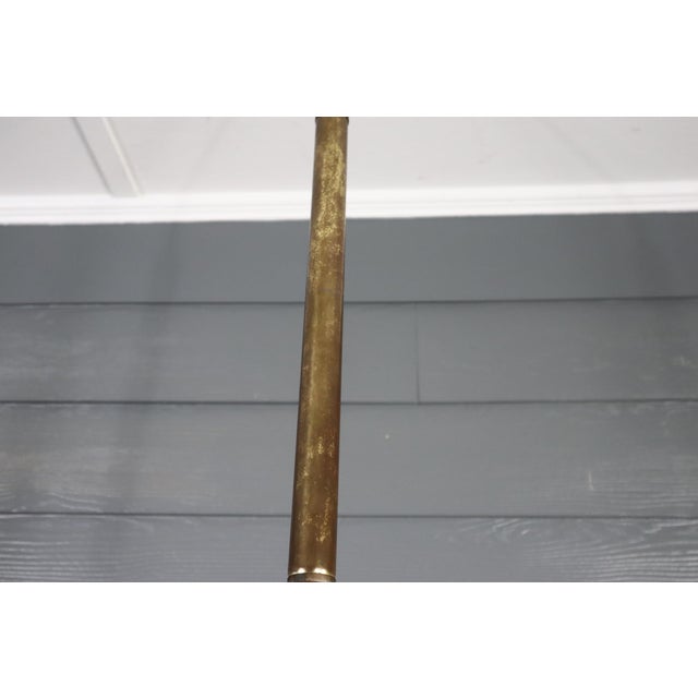 Very cool vintage mid century tension pole floor lamp spun Fiberglass shades. It is in good vintage condition with some...