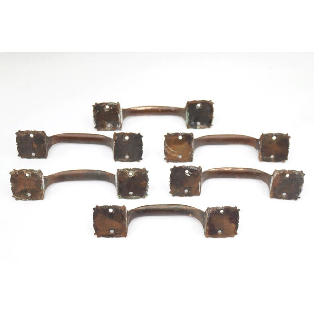Antique Gothic style cast bronze lift handles that could be used on furniture or windows. The original mounting screws are...