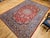 Vintage Persian Isfahan Rug, Hand-Knotted Wool, Floral Pattern, Red & Blue, 9x12 For Sale - Image 4 of 16