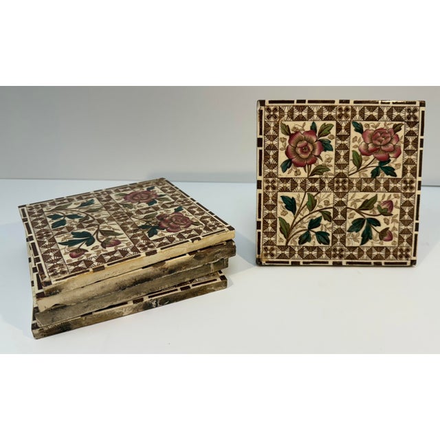 Antique English Decorative Tile, circa 1880 Glazed ceramic tile with polychrome transfer decoration, featuring an ornate...