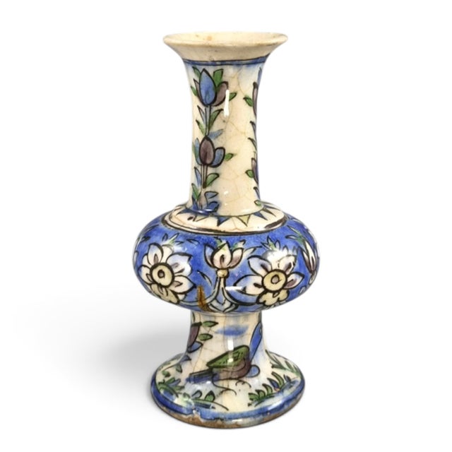 A highly decorative antique West Asian, or Middle Eastern, polychrome glazed ceramic vase dating from the late 19th or...