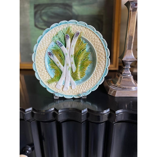 A hand painted majolica asparagus plate made by Salins in the late 19th century, in the Salins-les-Bains region of France....