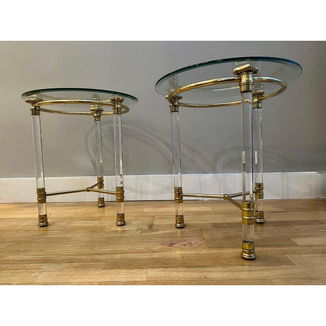 A pair of tall acrylic glass and lacquered brass side or end tables by Orsenigo Italy. Circular bevelled clear glass tops...