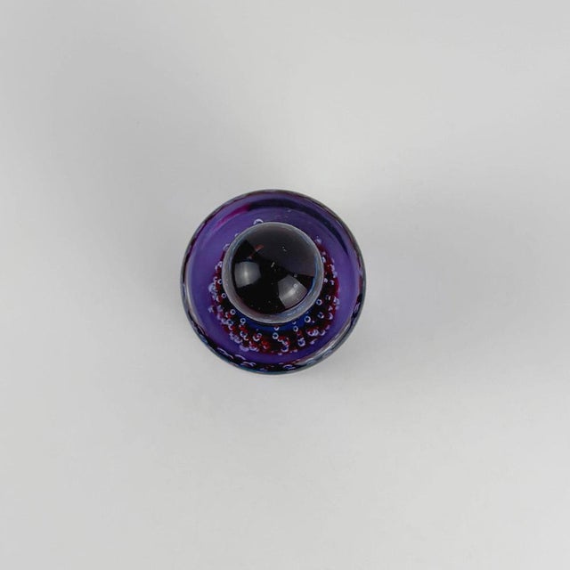 This Murano glass paperweight by Fratelli Toso was made in Murano, Italy, during the 1960s, combining neodymium glass with...