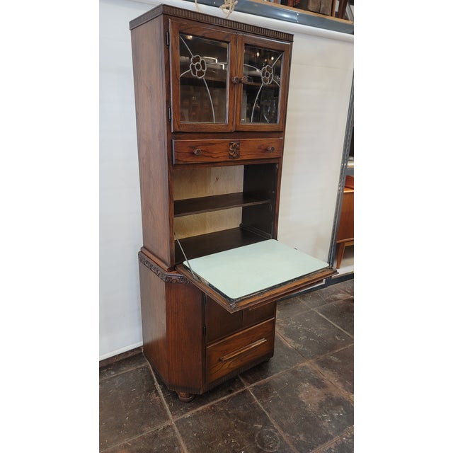 Antique Maidsaver Lusty Hoosier Kitchen Cabinet Carved Oak With Stained Glass Doors For Sale - Image 4 of 12