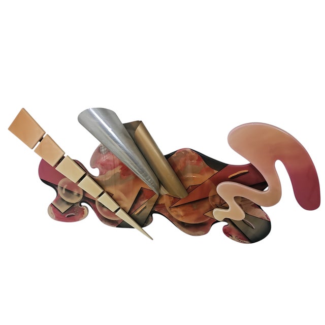 Post modern style mixed media wall sculpture signed by dean Johnson. Painted and enameled colored finishes with signature...