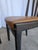 Available are 2 vintage dining chairs made by LIP Radomlje in Yugoslavia during the 1970s. The chairs feature solid black...
