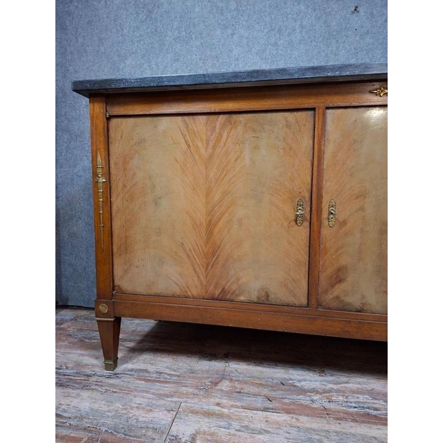 Empire style mahogany veneer sideboard – early 20th century a beautiful and wide empire style sideboard, veneered in flame...