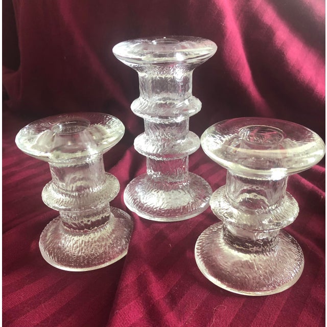 In the style of Timo Sarpaneva of Iitalla. Molded glass textured vintage candle holder trio. Good condition.