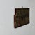 A delightful salvaged remnant of an antique sign that we believe originally said Distributor of Huggins. There might have...