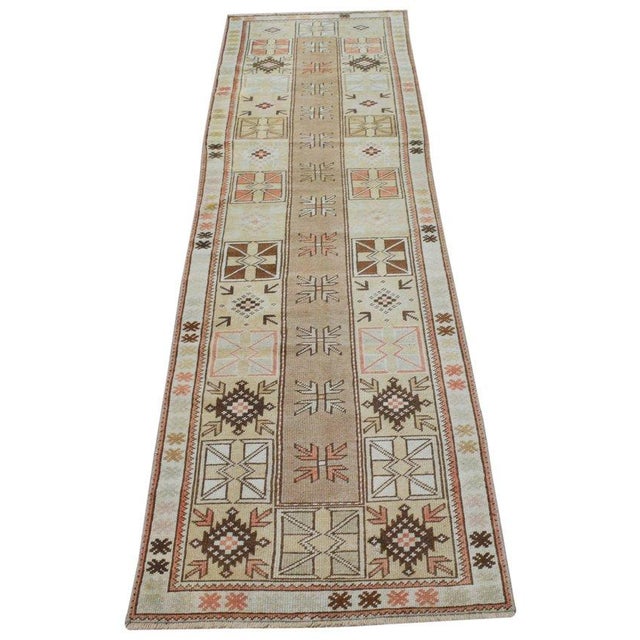 Hand-knotted with care using traditional rug-making techniques, this wool rug blends timeless craftsmanship with a modern...