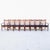 A beautifully preserved set of eight Scandinavian mid-century modern spindle-back dining chairs by Arne Vodder, produced...