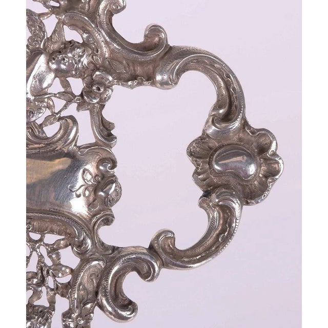 Antique Italian silver infuser tray in the Rococo style circa 1820 Scrolled feet open handles and a reticulated edge with...