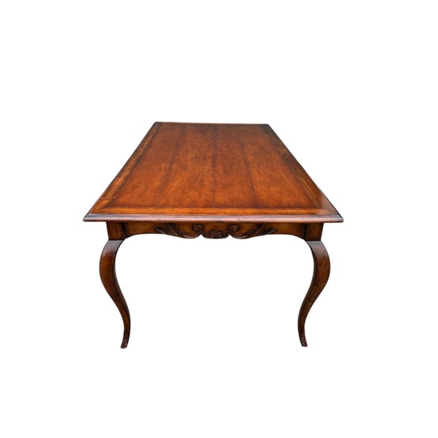 Quick Hits: French Country meets high-end craftsmanship Elegant cabriole legs and floral-carved apron Warm, medium-toned...