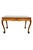 A timeless vintage tiger oak writing desk featuring elegant cabriole legs terminating in carved ball-and-claw feet....