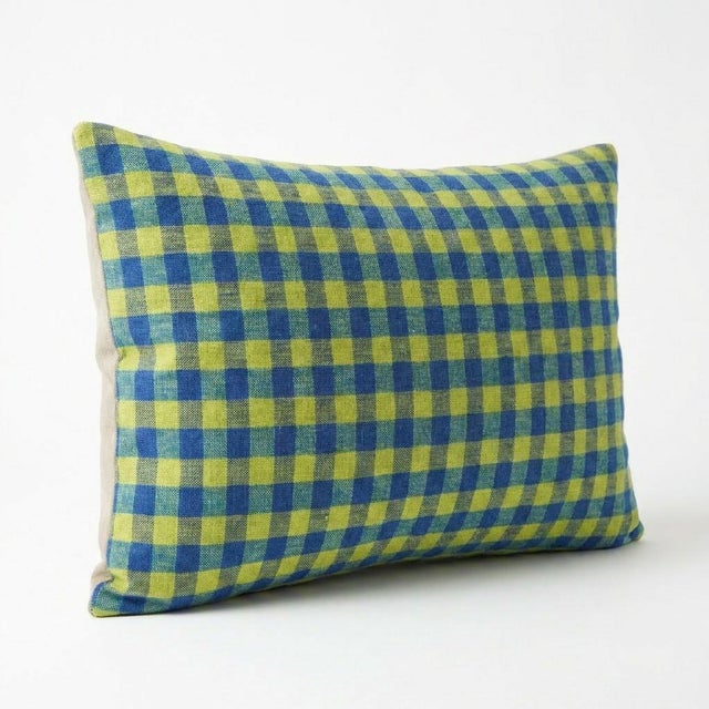 This beautiful 16'' x 24'' pillow cover was made from an authentic Turkish rug. Bright colors of wool adorn the front of...