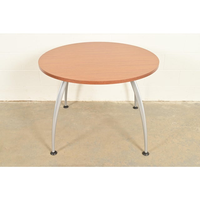 A sleek and stylish Modern or Mid-Century Modern spider leg round dining table, breakfast table, or game table In the...