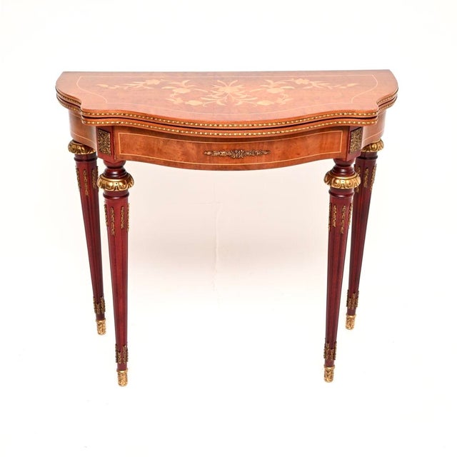 An absolutely stunning antique French inlaid card / console table, dating from the 1950’s. The quality is outstanding,...