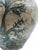 A majolica ceramic storage jar or flask dating from the 19th to the early 20th century, associated with the folk pottery...