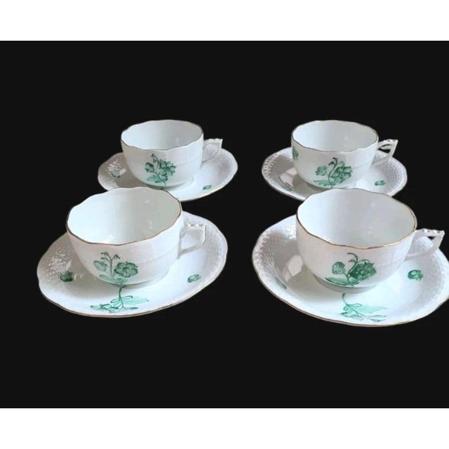 Herend vintage set of four coffee cups and saucers, crafted between 1948 and 1993. The particular marks on them were used...