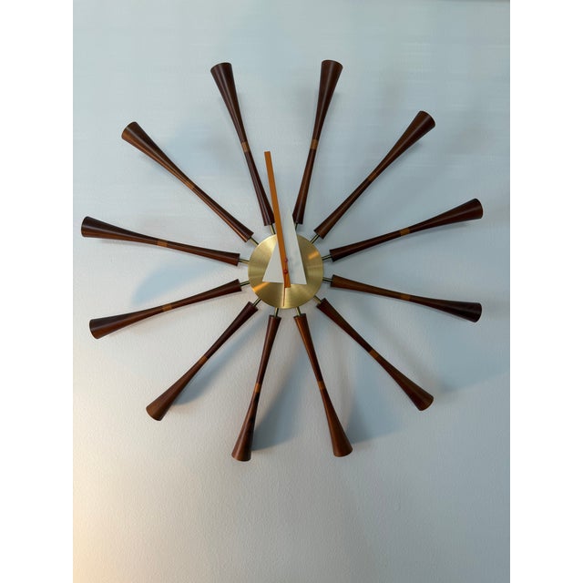 The Spindle Clock (1957) is one of more than 150 clocks designed by George Nelson Associates for the Howard Miller Clock...