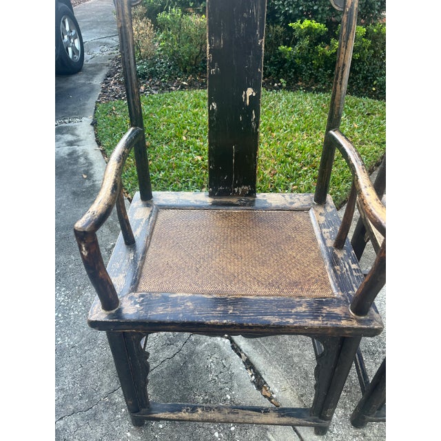 Pair of antique dark brown Asian chairs. Straight lines, sturdy, beautiful patina.