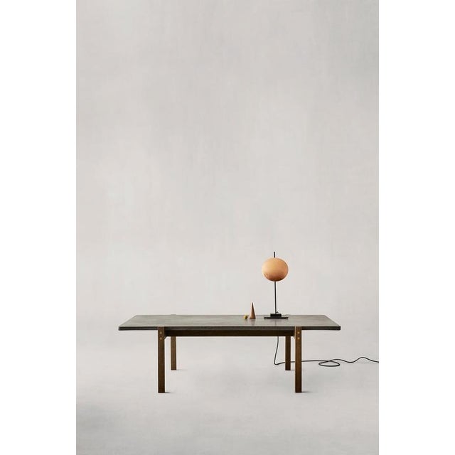 Eugene Dark Concrete Top and Dark Oak Legs Coffee Table by Eberhart Furniture Dimensions: D 125 x W 70 x H 37 cm....