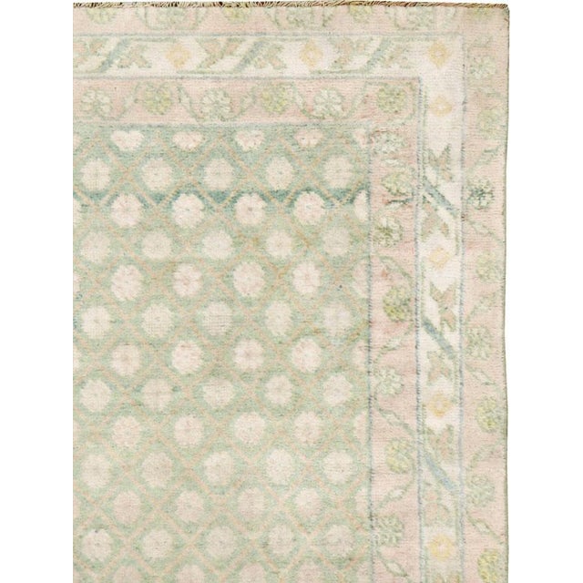 A vintage Indian cotton Agra carpet from the second quarter of the 20th century. Measures: 4' 0" x 6' 4"