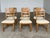 A sculptural and highly recognizable set of six high-back “Razorblade” dining chairs designed by Henning (Henry) Kjærnulf...