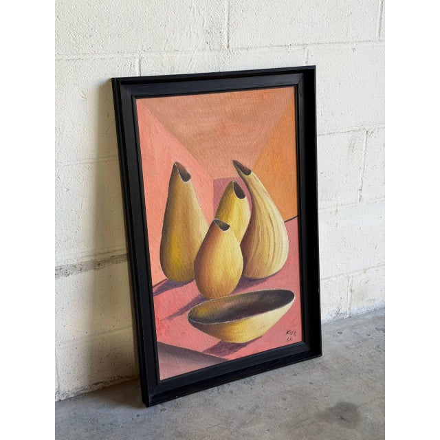 This striking canvas painting features an expressive still life composition with vessels and a plate in warm tones. Framed...