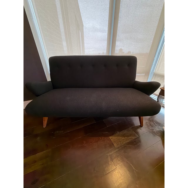 Reupholstered in beautiful brown boucle fabric , Jen Risom's 1950's classic settee with stained birch legs is elegant and...