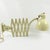 This is an original extendable metal wall lamp or scissor sconce designed by famous Bauhaus school metal workshop foreman...