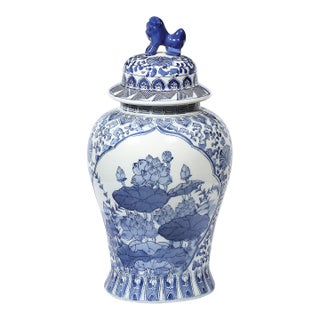 Chinese Hand Painted Blue and White Fudog and Flower Temple Jar For Sale