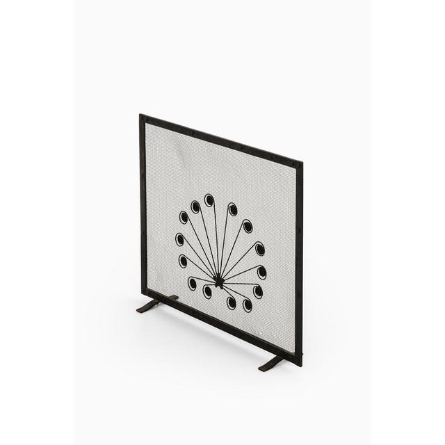 This mid-century fire guard, attributed to Swedish designer Gunnar Ander and produced in Sweden during the 1960s,...