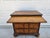 This three-drawer chest sits atop bun feet and is in the style of an early English William and Mary style chest of...