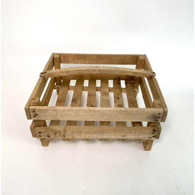 This rustic vintage Belgian potato crate with handle makes a conversational catchall or fruit basket. A compact size that...