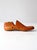 A vintage 1930s articulated wooden shoe last by United Shoe Machinery, retaining its warm worn finish, industrial...